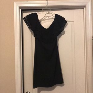 Off or on shoulder mid length black dress